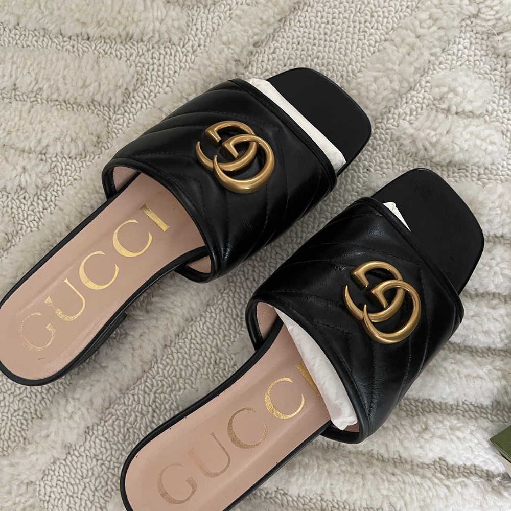 Gucci Black Slide Sandals with Gold Accents